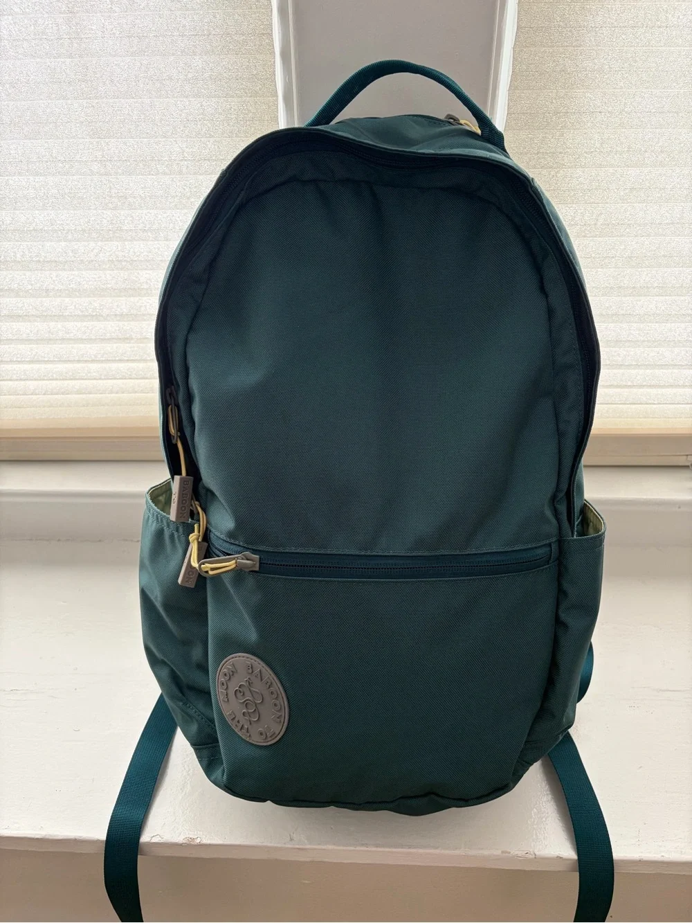 Baboon to the moon city backpack in teal with yellow